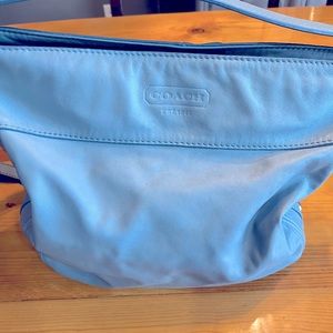 Baby blue Coach bag.